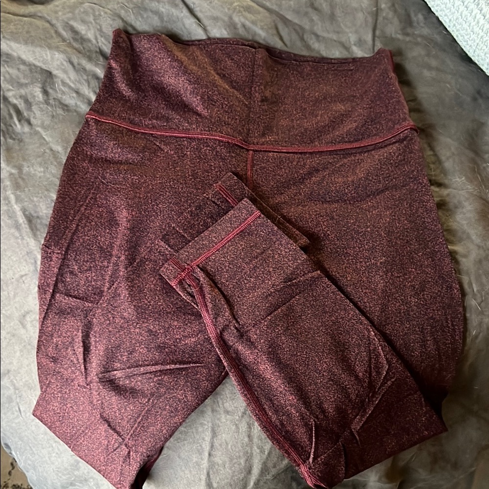 Lululemon Athletica Red Leggings with High Waist and Stretchy Fabric